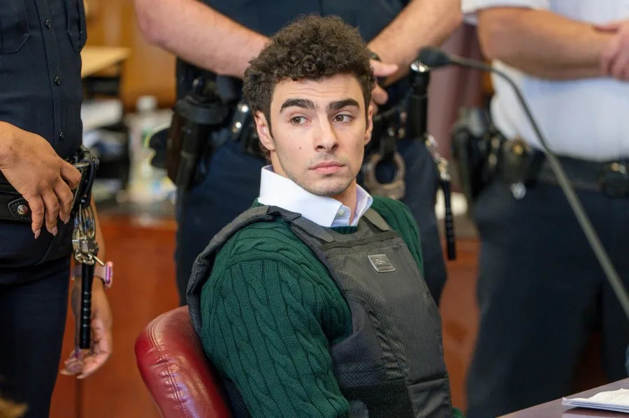 Body language expert reveals truth behind Luigi Mangione's 'relaxed' smile in court