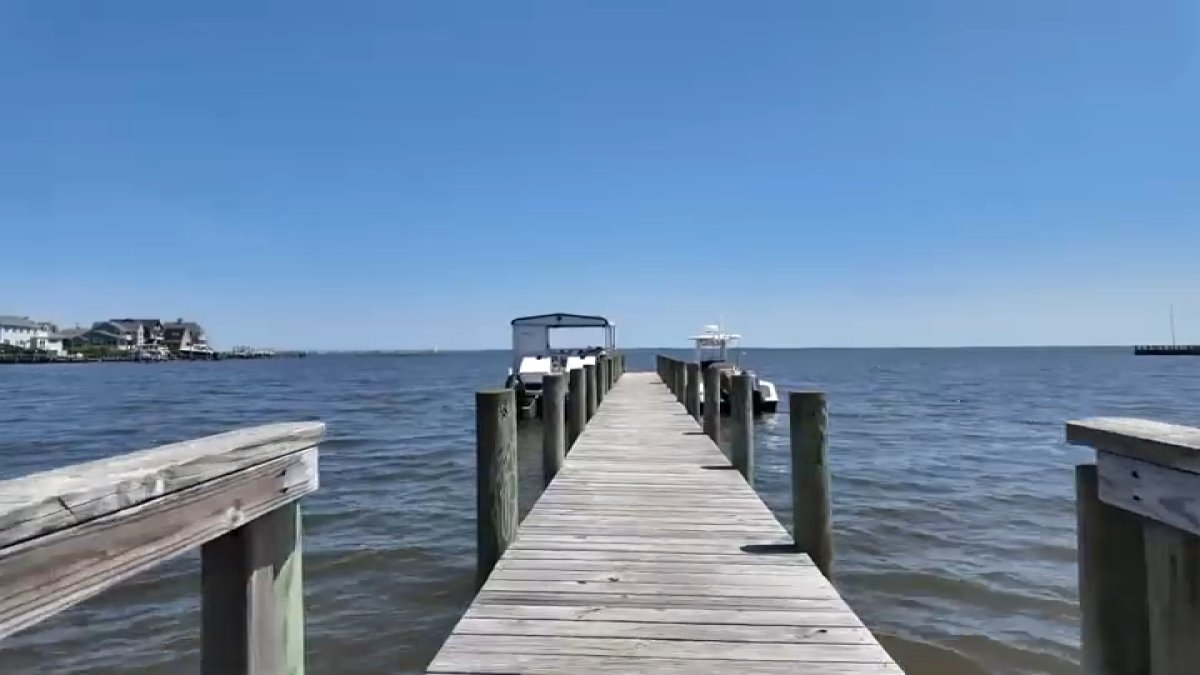 Boat overturns off Liberty Island coast; woman and child in critical condition