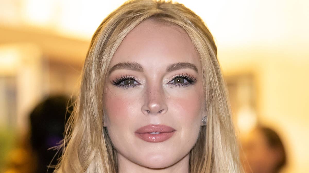 Lindsay Lohan's long auburn waves styled for the film's promotional appearances