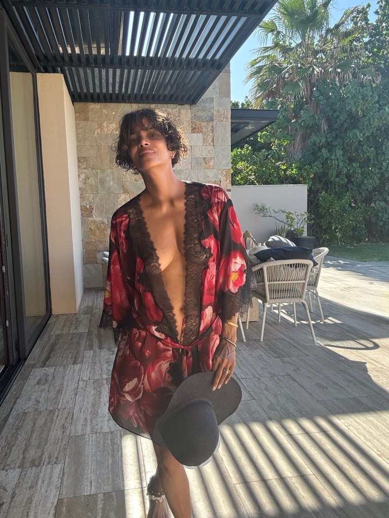 Halle Berry celebrates 60th birthday in nothing but a silky robe