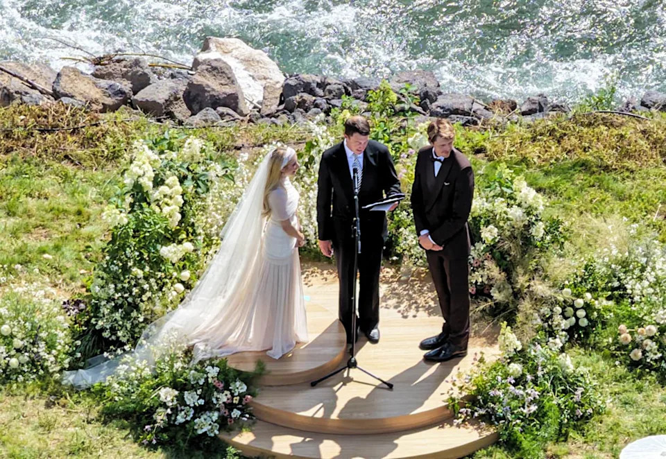 Emma Roberts changing into her black after-party dress at the Idaho wedding reception.