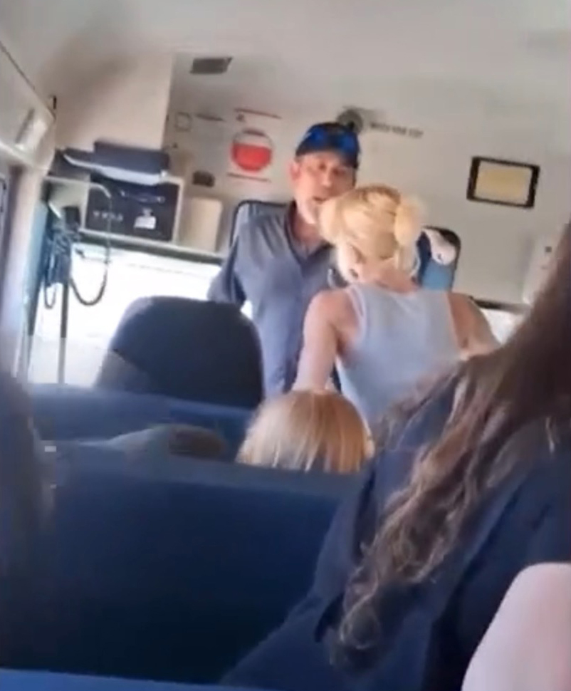 Mayhem on California school bus as parents smash inside and kids forced to climb out windows
