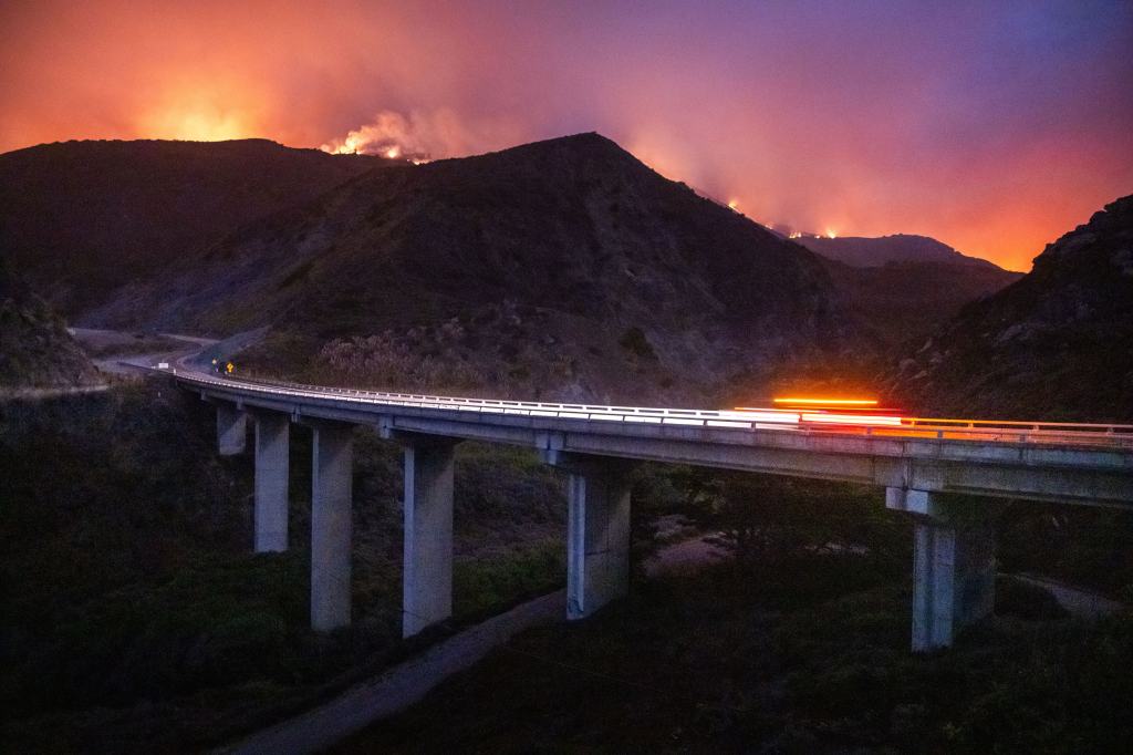 Fast-moving wildfire explodes in size again as it looms over luxury Big Sur mansions