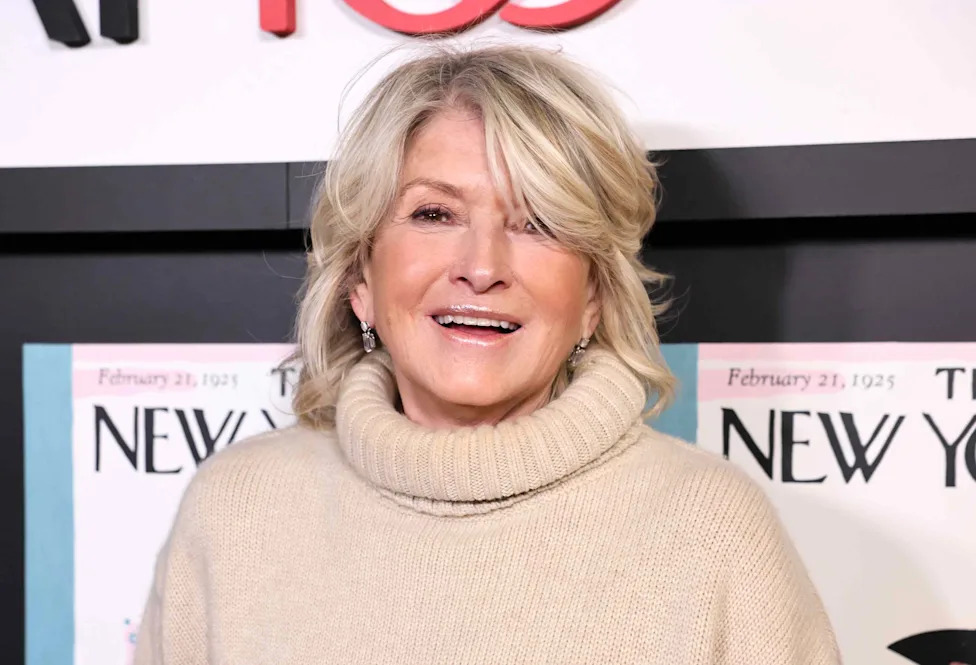 Martha Stewart, 85, presenting her newly dyed rose gold hair in a confident pose