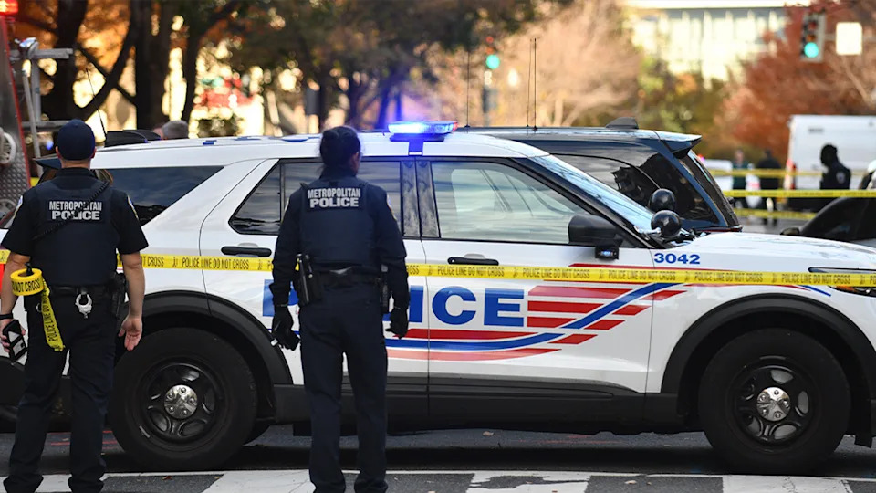 Metropolitan Police Department officials discussing the arrested suspects and charges