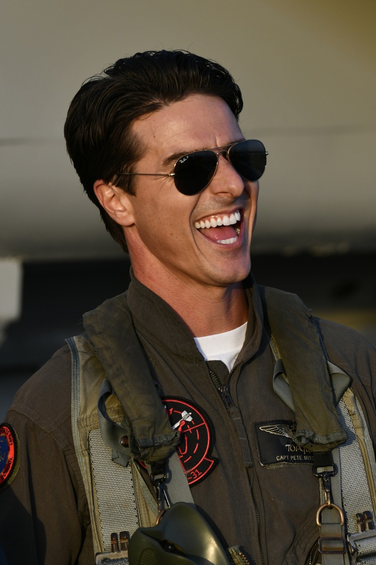 LeBlanc posing in his flight suit with fans at Oracle Park during the event