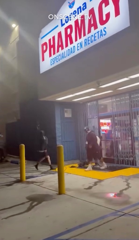 Moment masked thugs loot California stores after 100 people seen loitering on the street