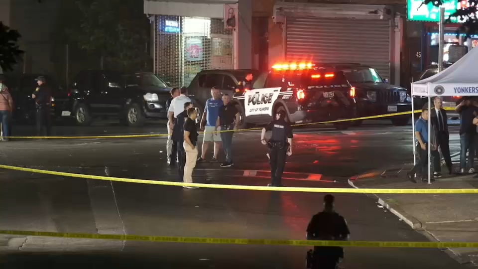 Officers responding to the scene of the shooting in Yonkers