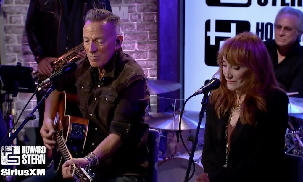 Bruce Springsteen and Patti Scialfa performing together onstage