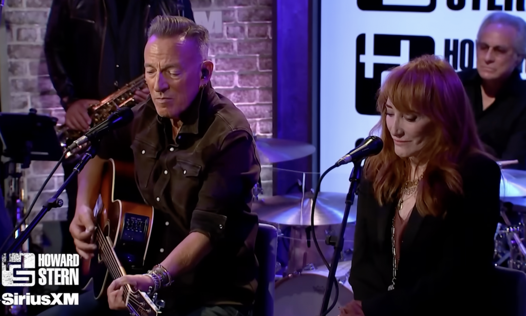 Bruce Springsteen and Patti Scialfa performing together onstage