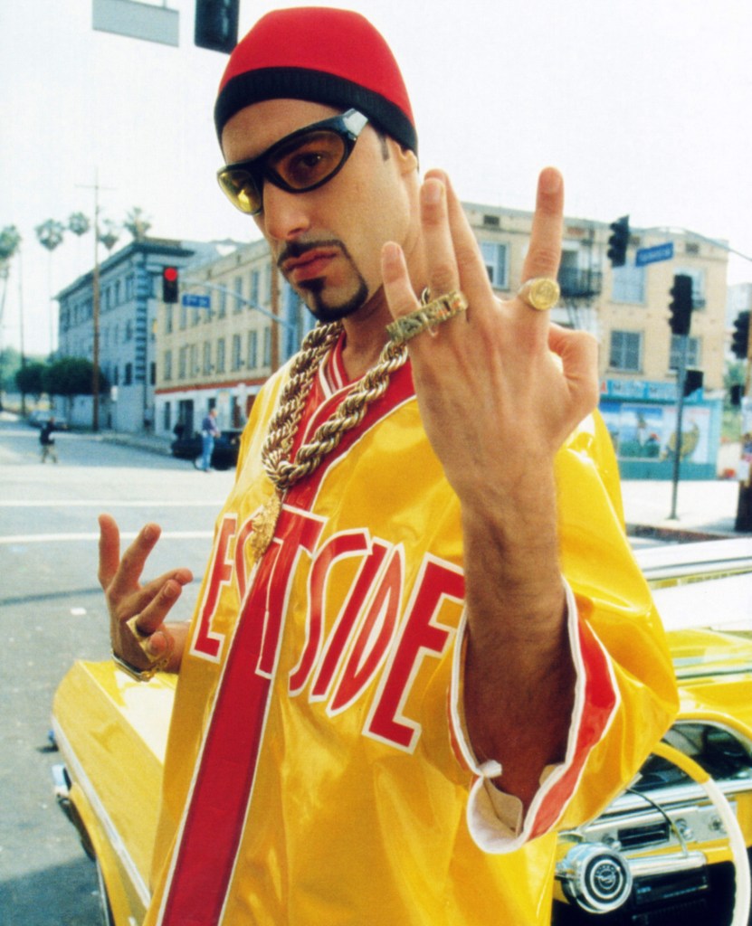Andrew Tate’s own lawyer compares him to absurd comedy character ‘Ali G’ as shackled influencer appears in court