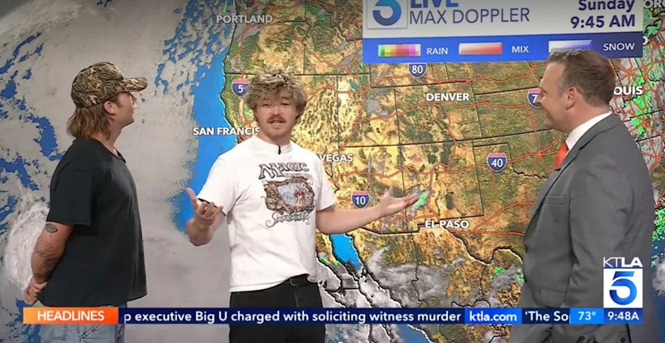 Zano with Kirk Hawkins at the KTLA weather wall during the broadcast