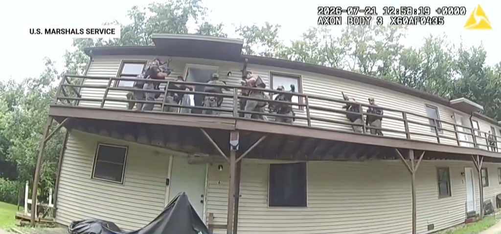 Harrowing video shows US Marshals plunge several feet when deck collapses at home of convicted sex offender
