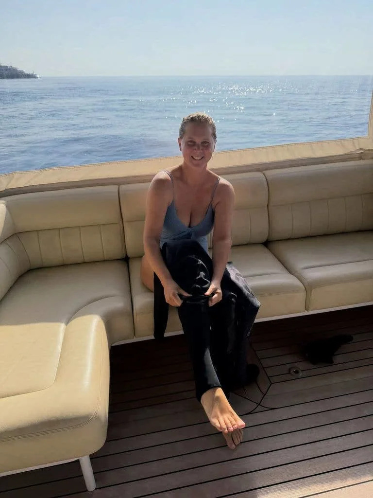 Amy Schumer in diving gear on yacht