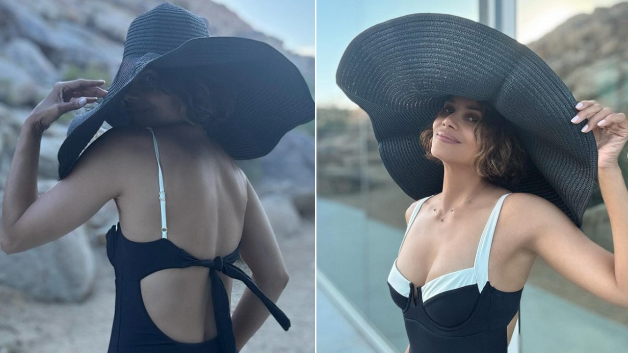Halle Berry posing with fiancé Van Hunt on their Fiji vacation.