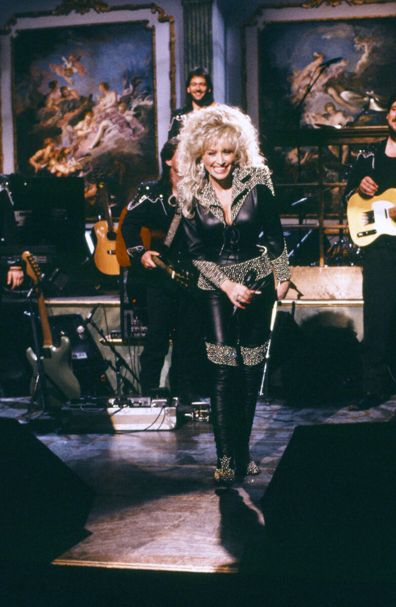 Dolly Parton’s big hair and bedazzled looks made her a fashion icon