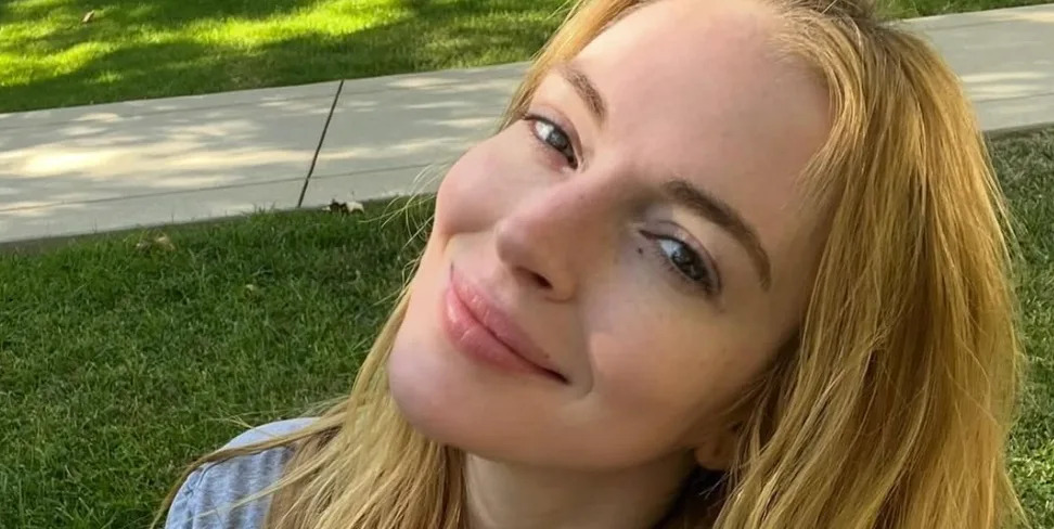 Lindsay Lohan on the red carpet with her iconic auburn waves