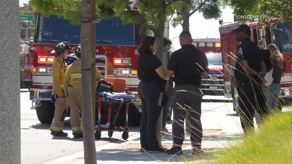 TikTok workers gathered outside the building after evacuation