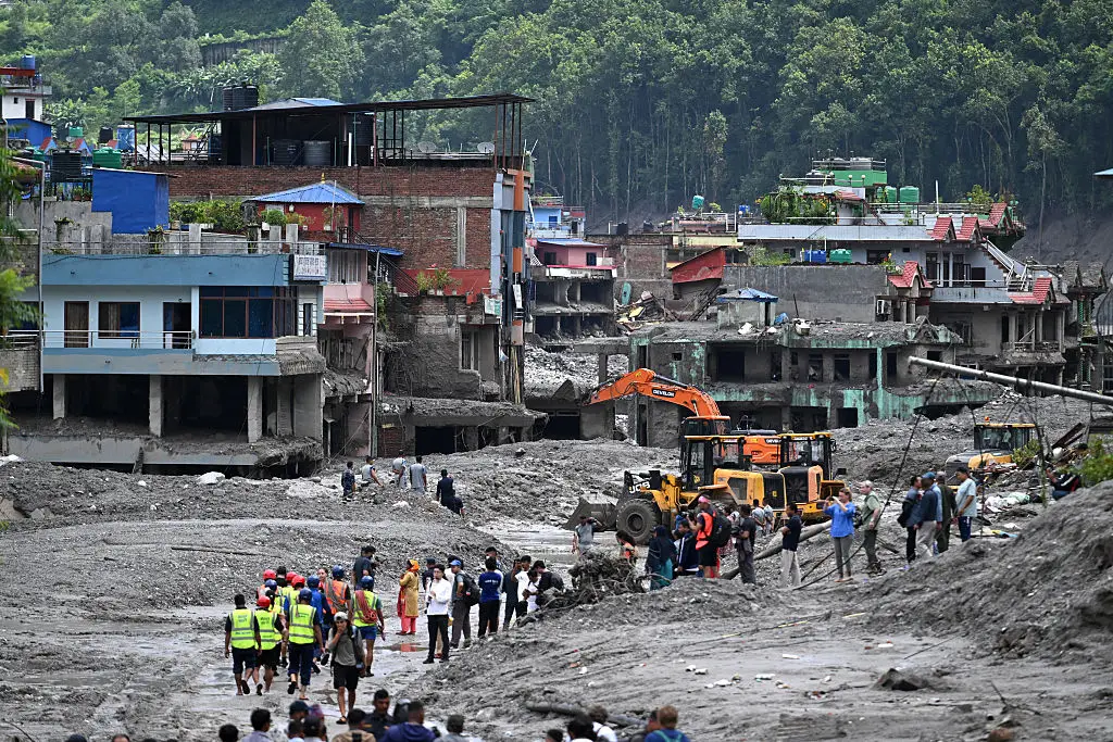 Harrowing moment five-year-old girl is pulled alive from rubble after devastating Nepal floods