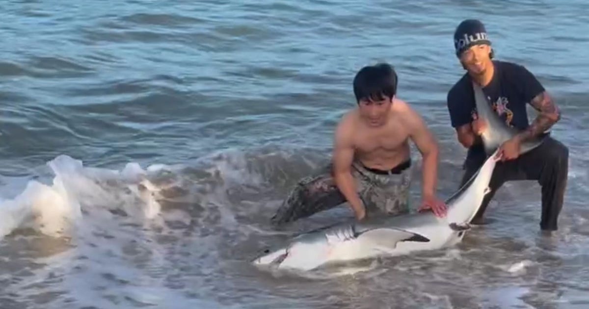 An angler fishing at Sunset Beach in Los Angeles