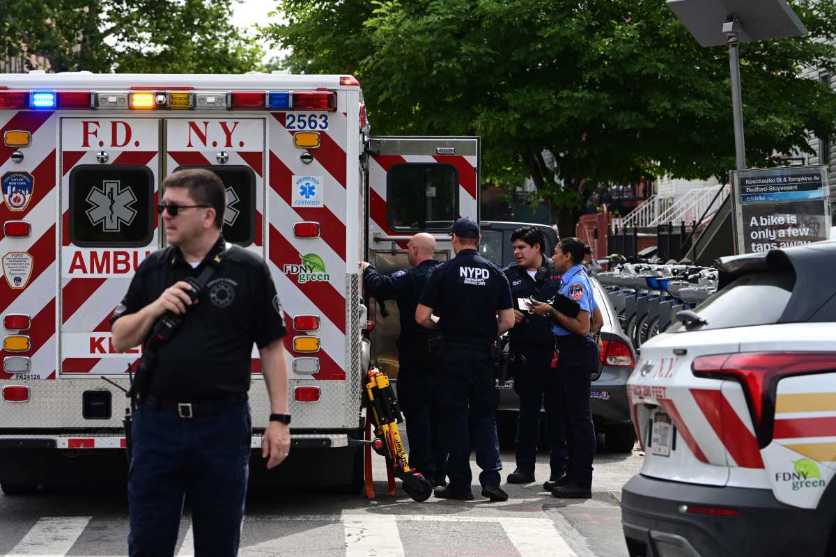 NYPD officers applauding Gale's recovery at the hospital