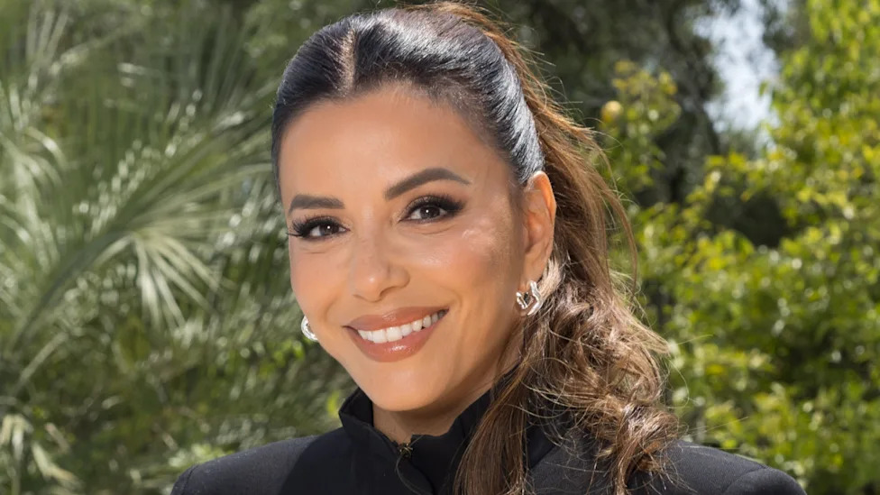 Eva Longoria, 51, displays fit figure in tiny blue bikini during beach day in Spain