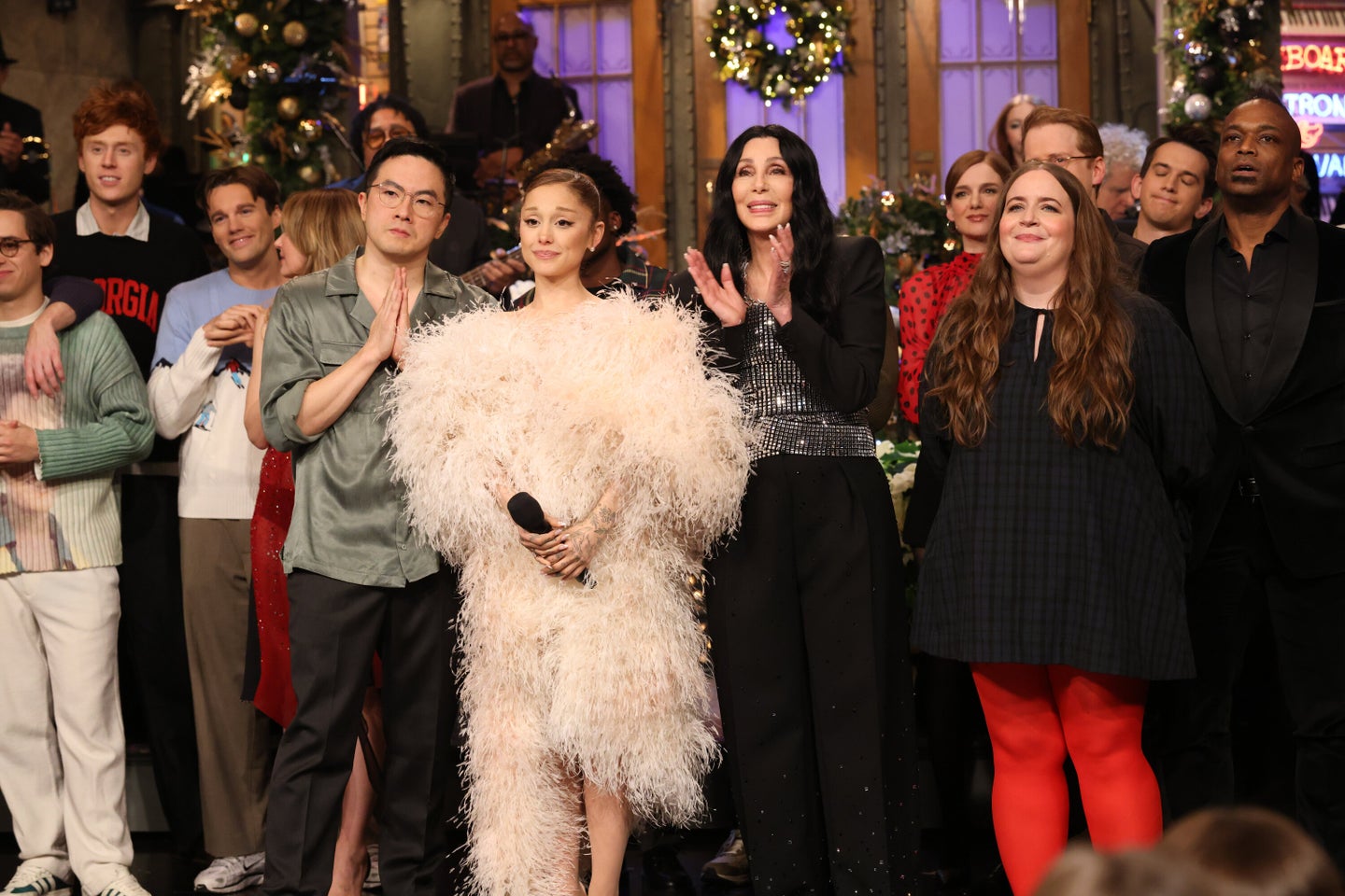 Bowen Yang performing in the SNL farewell sketch with Ariana Grande and Cher.