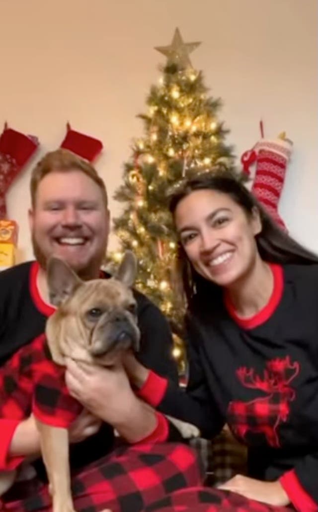 In the doghouse! AOC’s sad sack ex Riley Roberts walks their pooch in first look since split news