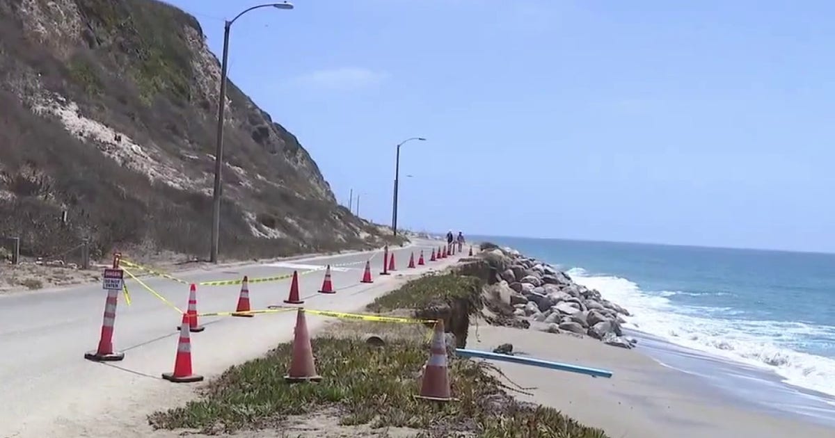 Parking lot and beach access closure signs