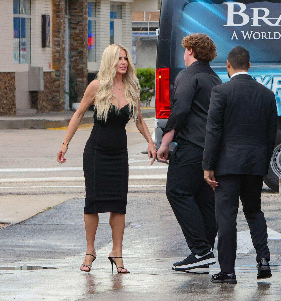 Kim Zolciak steps out for Palm Beach dinner as son KJ remains behind bars on sexual assault charges