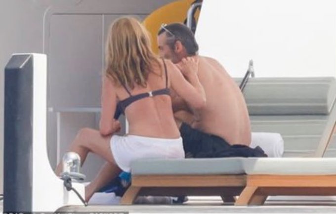 Bikini-clad Jennifer Aniston and boyfriend Jim Curtis make out during yacht getaway