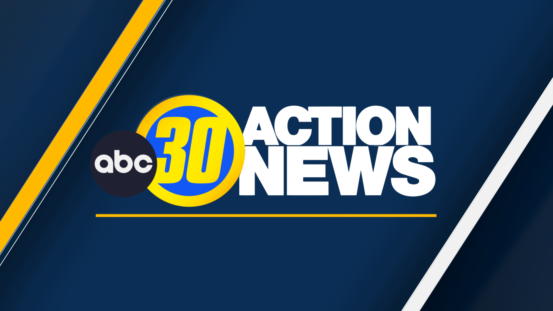 Firefighters battling a tanker truck fire on a busy highway