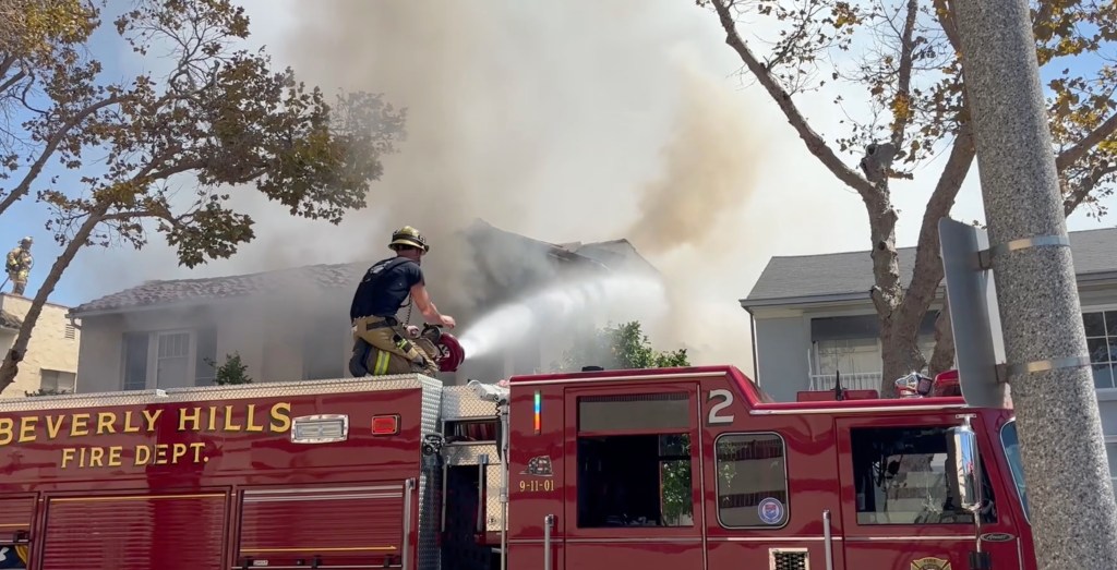 Massive fire engulfs Beverly Hills apartment complex as entire roof caves in