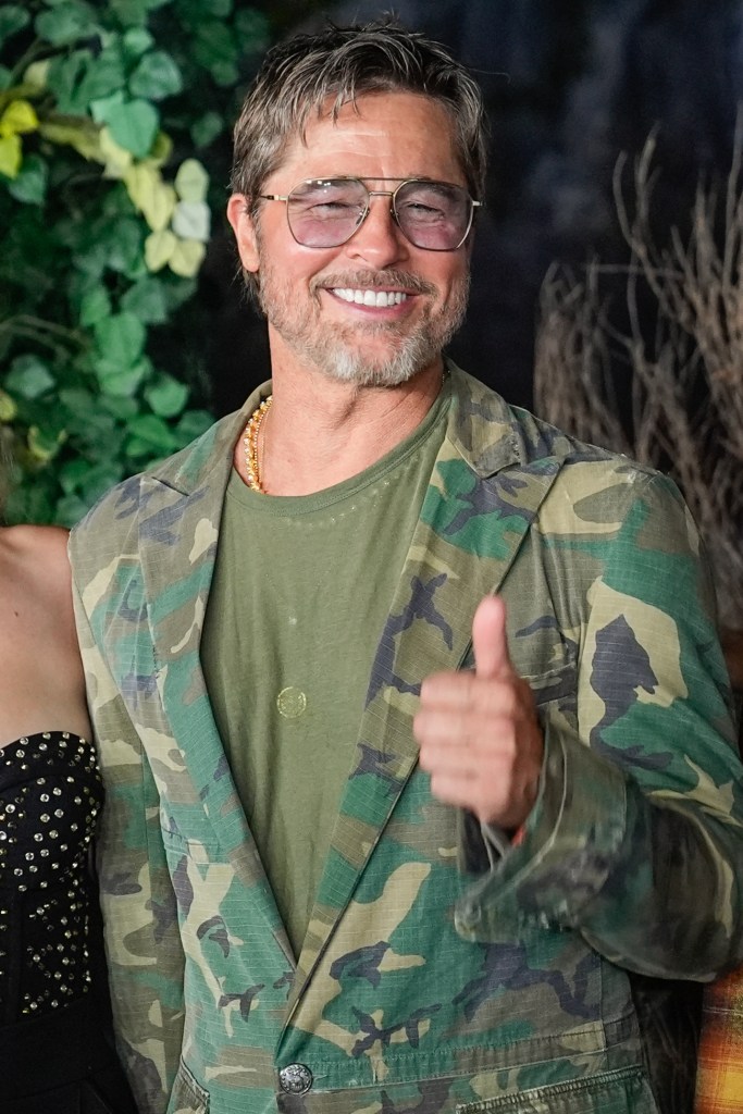 Brad Pitt gets into character in camo suit at ‘Heart of the Beast’ premiere