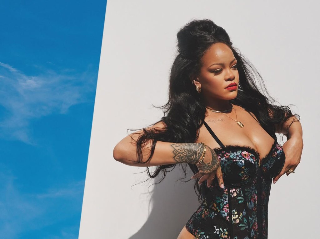 Rihanna gets cheeky in a lace corset and thong for Savage X Fenty