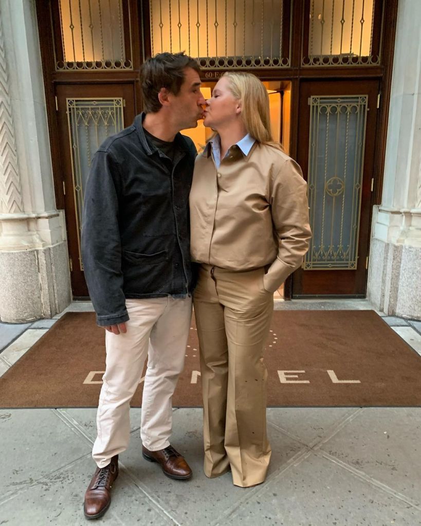 Amy Schumer and Chris Fischer reach divorce agreement nearly 1 year after split