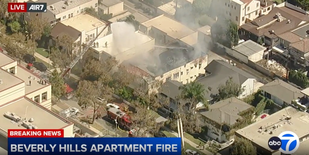 Massive fire engulfs Beverly Hills apartment complex as entire roof caves in