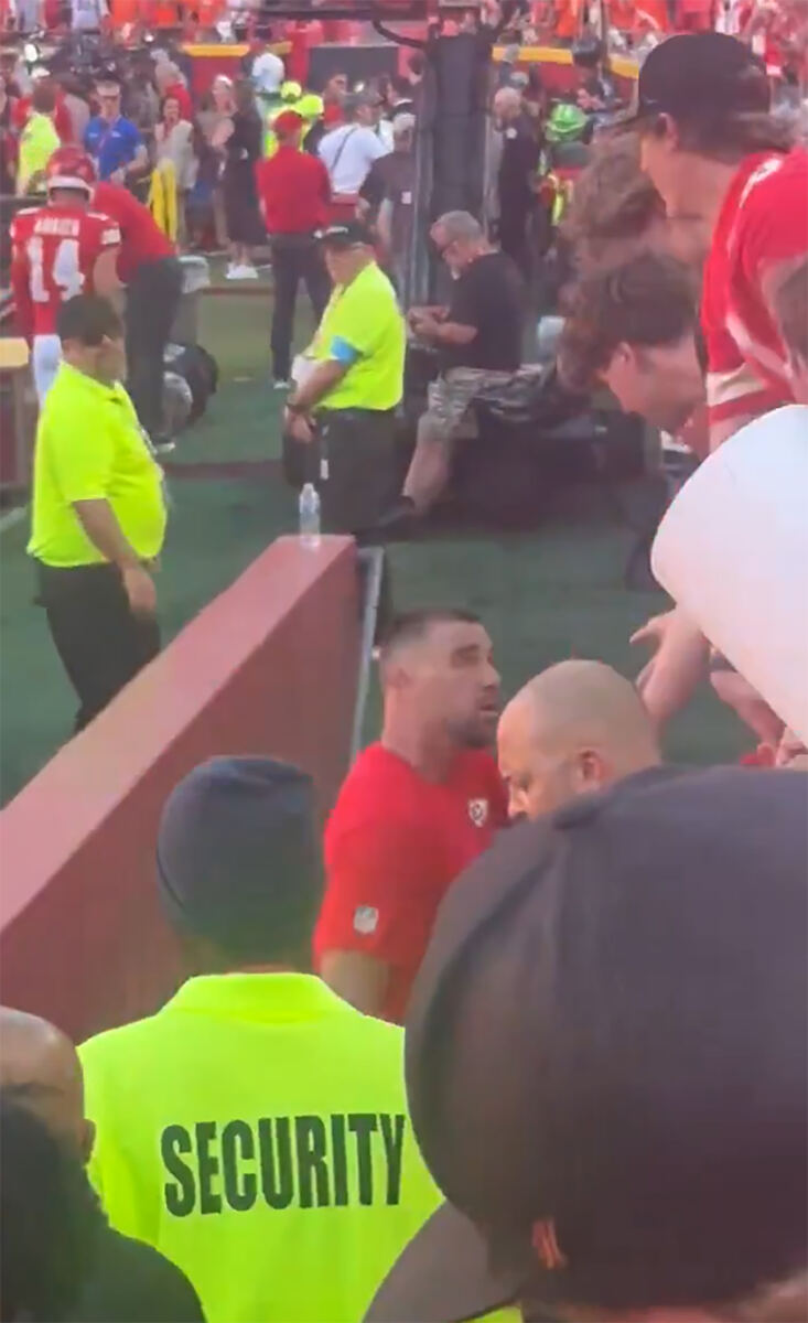 Shocked Travis Kelce slaps away fan who attempted to steal Chiefs glove