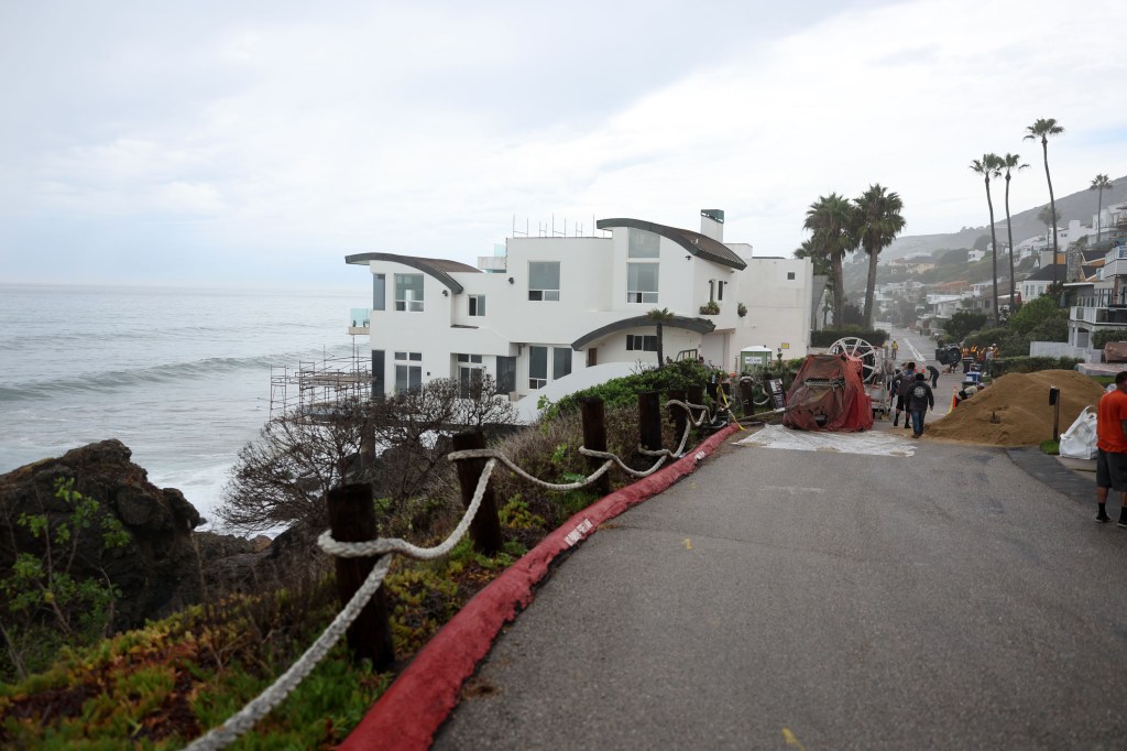 Nicolas Cage home faces race against time as sea wall fails and extreme measures deployed to save neighborhood