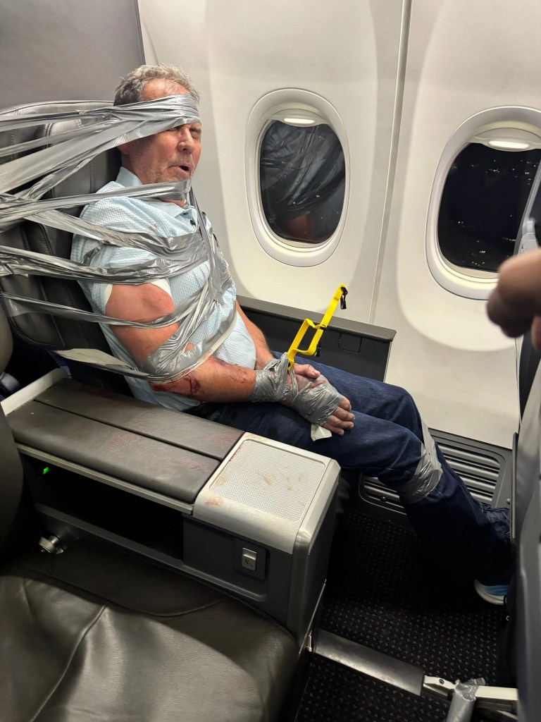 Realtor duct-taped after mid-flight N-word meltdown arrested within minutes of landing, new video shows