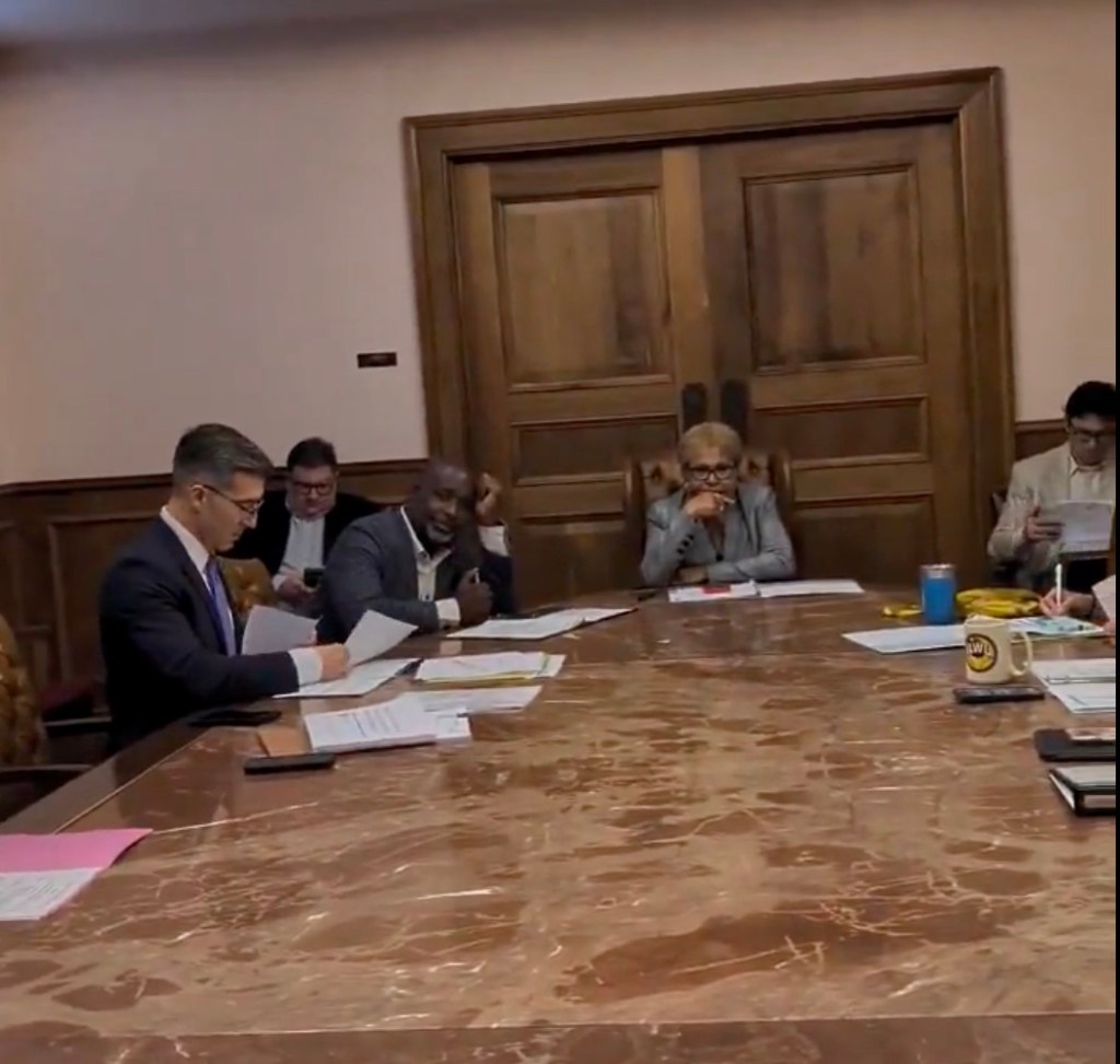 Wild moment LA gadfly storms City Hall meeting and humiliates Karen Bass in front of stunned councilors