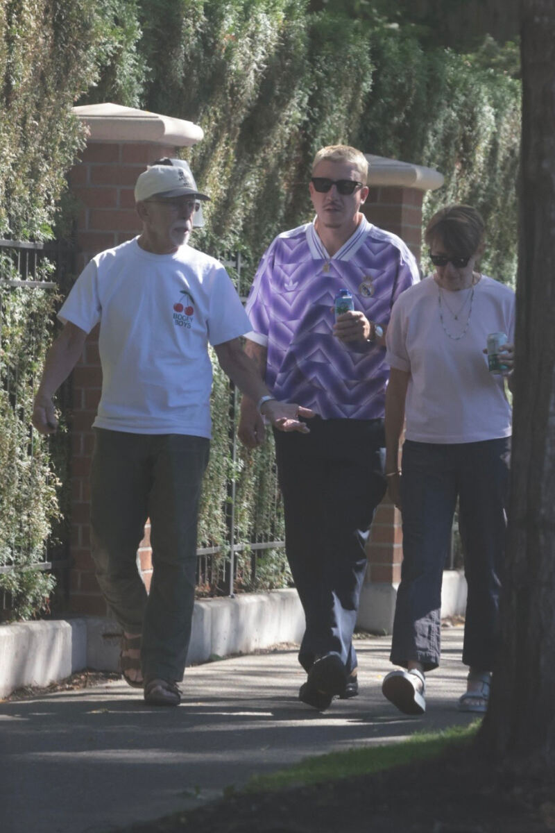 Macklemore goes on a walk with parents in Seattle in first sighting since Ed Sheeran concert debacle