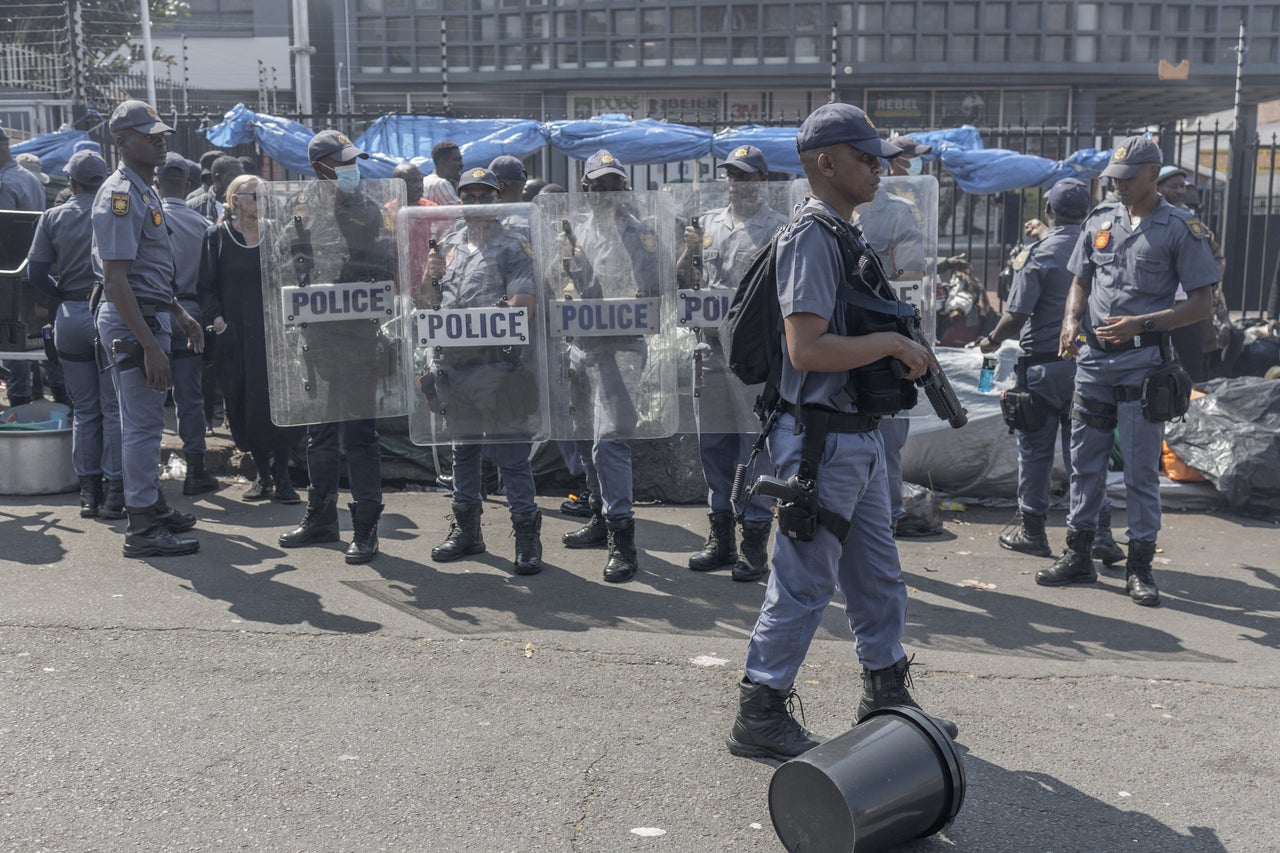 South Africa police launch manhunt after 17 killed in tavern shooting
