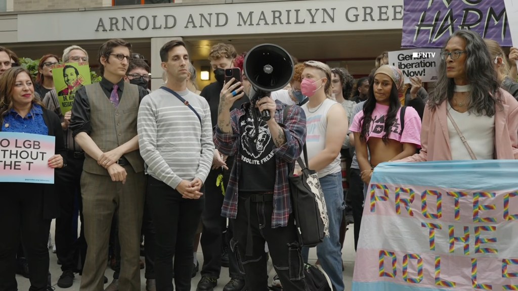 Trans activists inject themselves with hormones in viral stunt protesting Trump’s DOJ deal