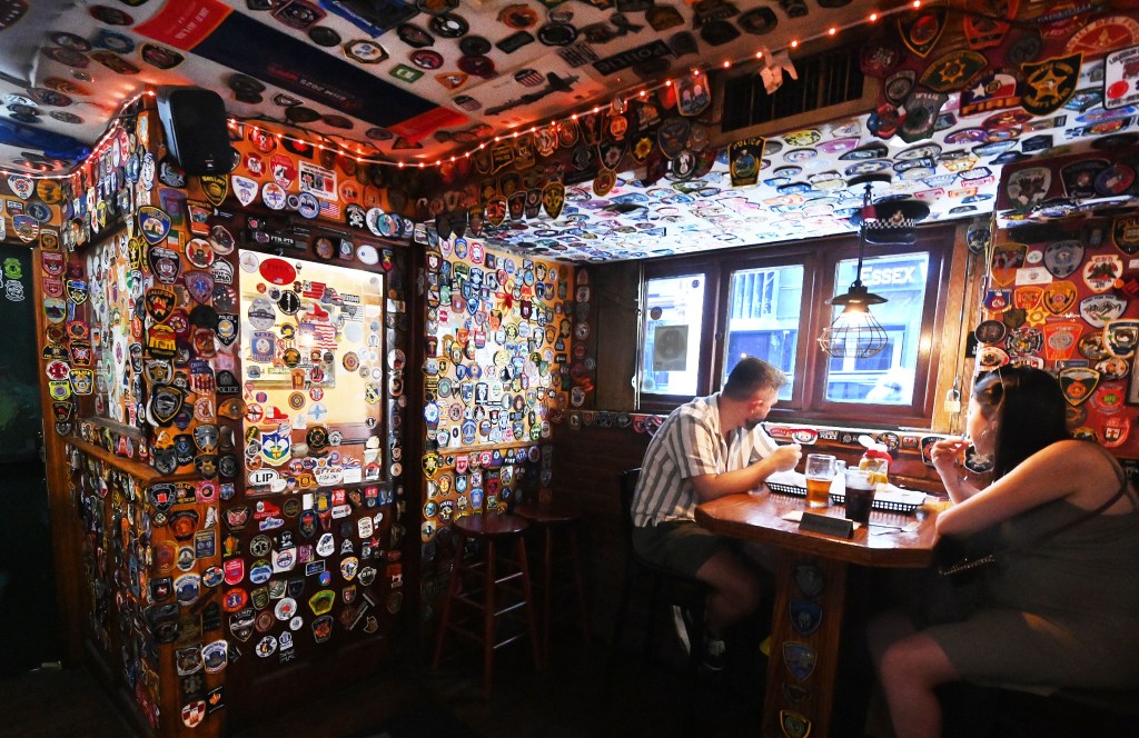 How a downtown Manhattan bar turned into a vibrant tribute to more than 7K first responders after 9/11