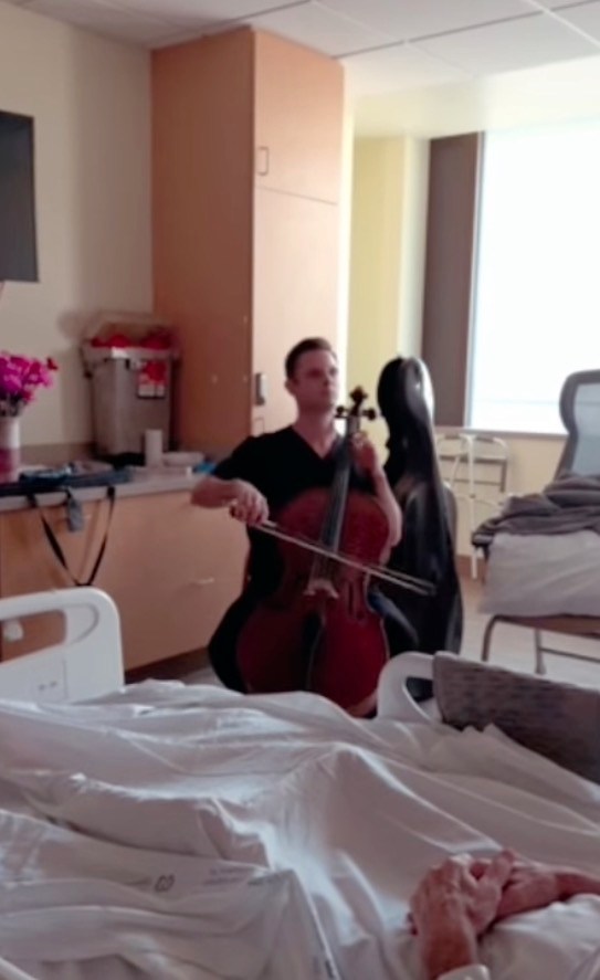 Heartwarming moment doctor plays cello for Army veteran before he has both legs amputated