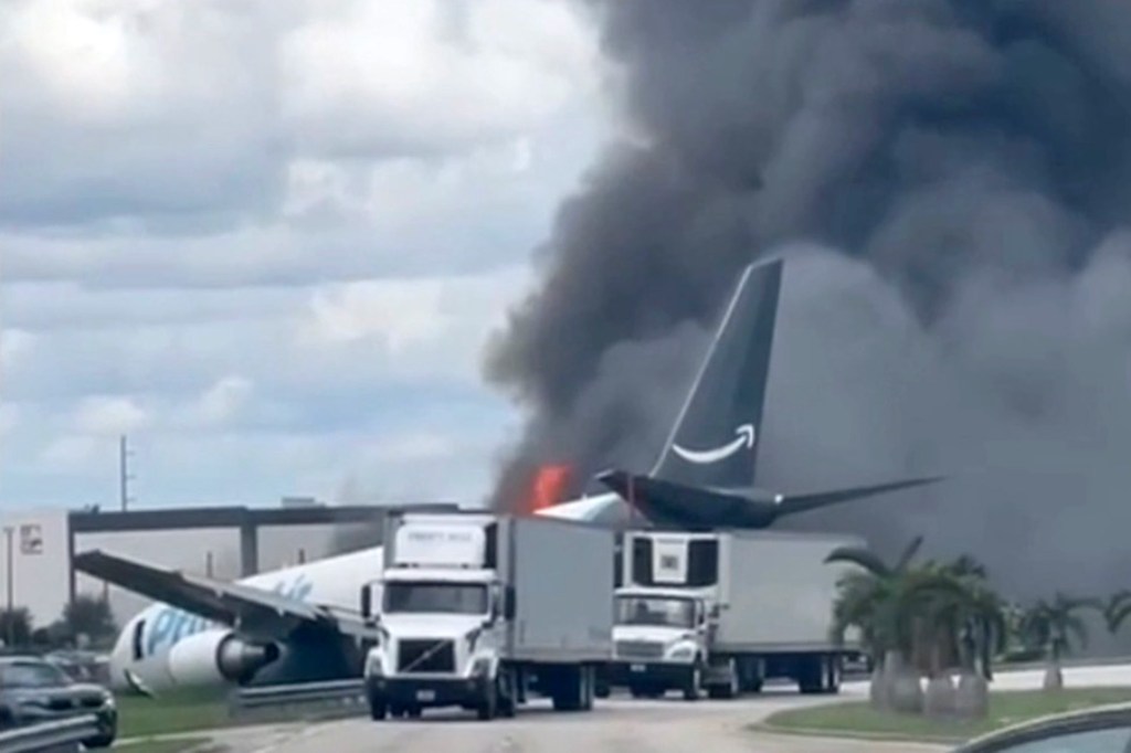 Flames shoot from Amazon cargo plane in dramatic video — as witnesses feared an explosion
