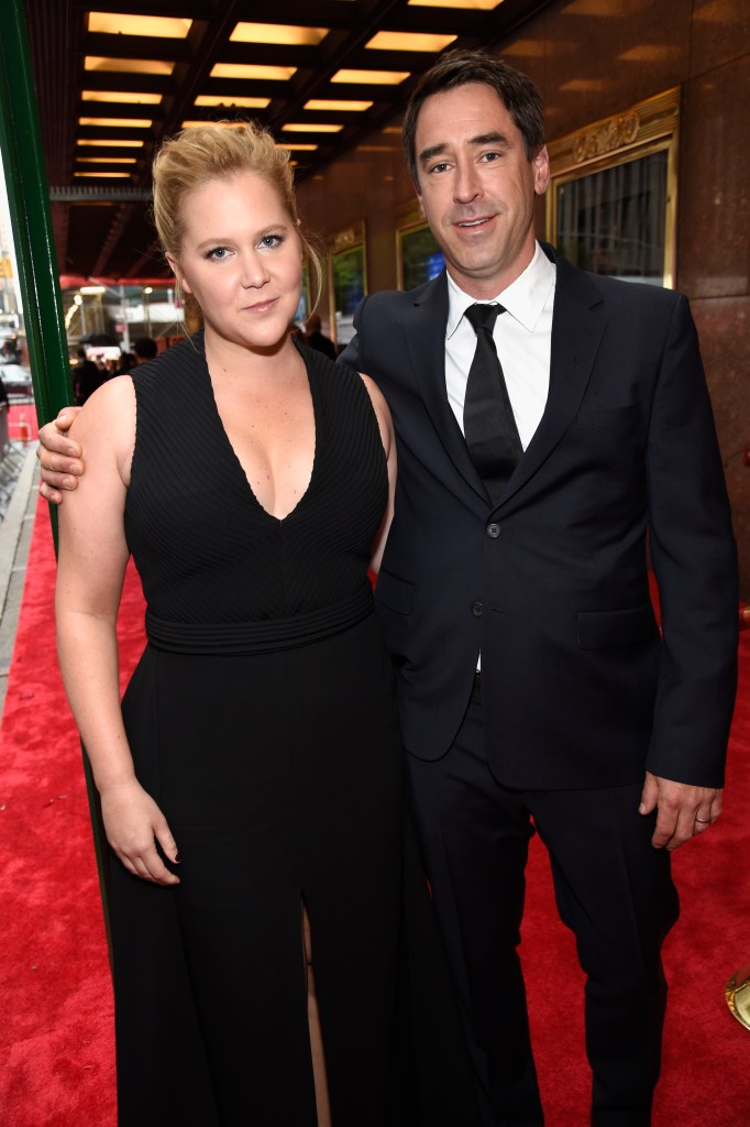 Amy Schumer and Chris Fischer reach divorce agreement nearly 1 year after split