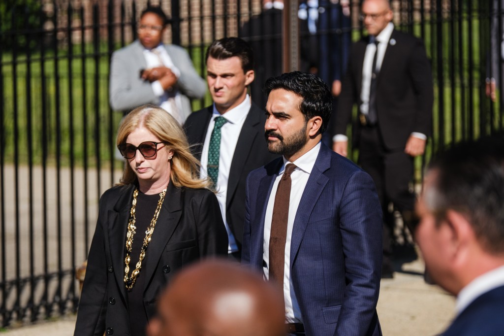Heartwrenching funeral photos capture tearful young daughter of NYPD recruit who collapsed during run at Police Academy