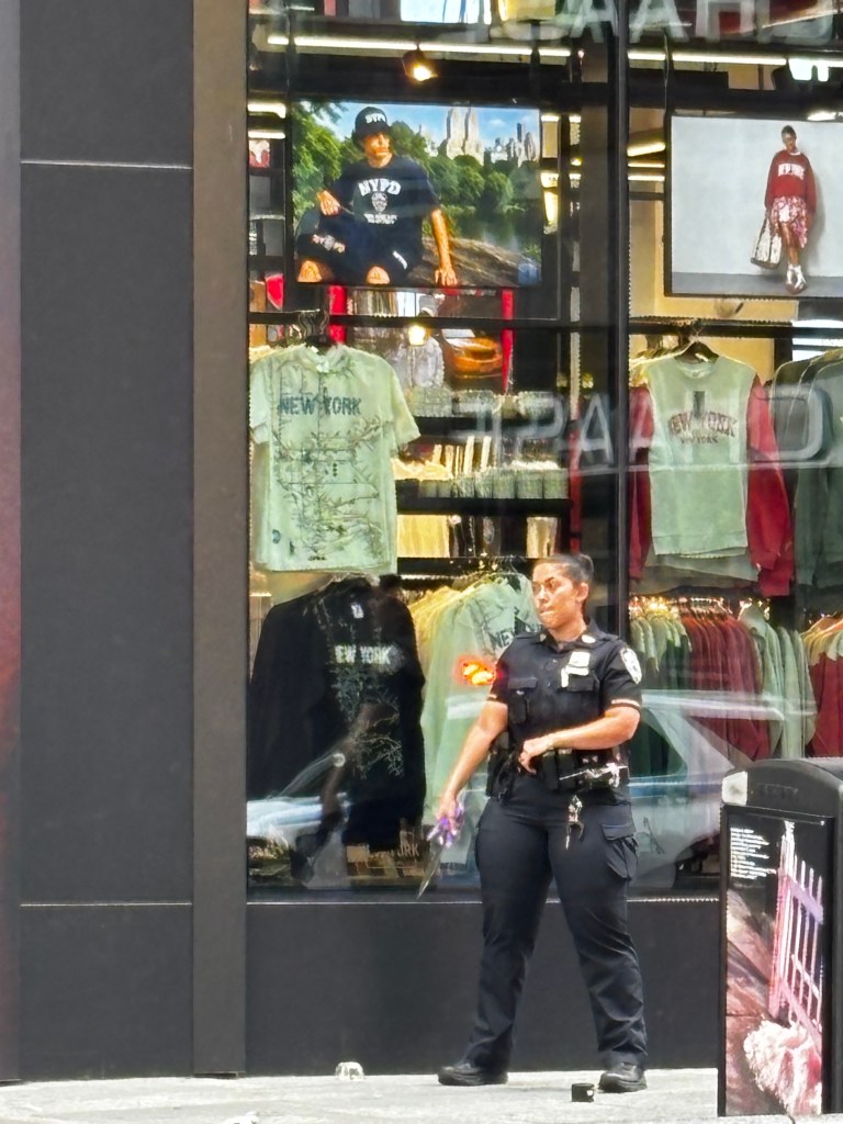 NYPD shoots knife-wielding woman accused of stabbing two people in Times Square